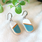 Handmade ceramic earrings in blue and white