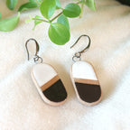 Handmade ceramic earrings in black and white