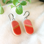 Handmade ceramic earrings in pink and red
