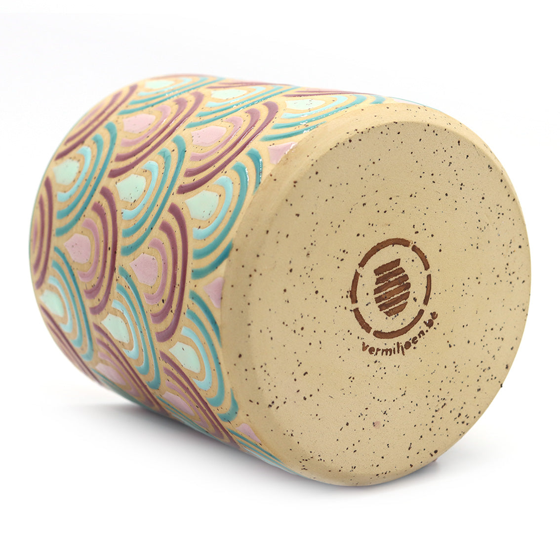 handmade ceramic planter with geometric pattern in vibrant colors