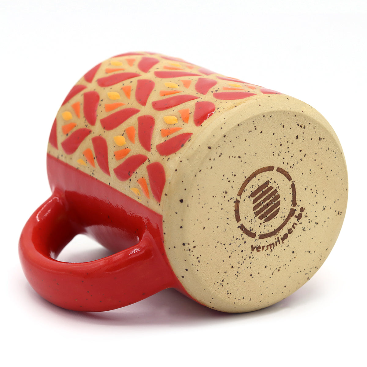Handmade stoneware mug with vibrant floral pattern