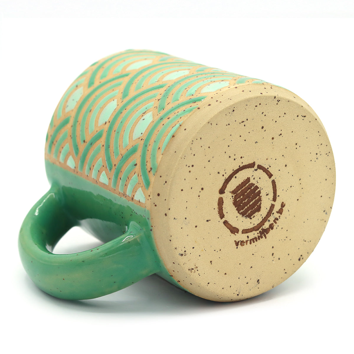 handmade stoneware mug with geometric pattern in green gradient