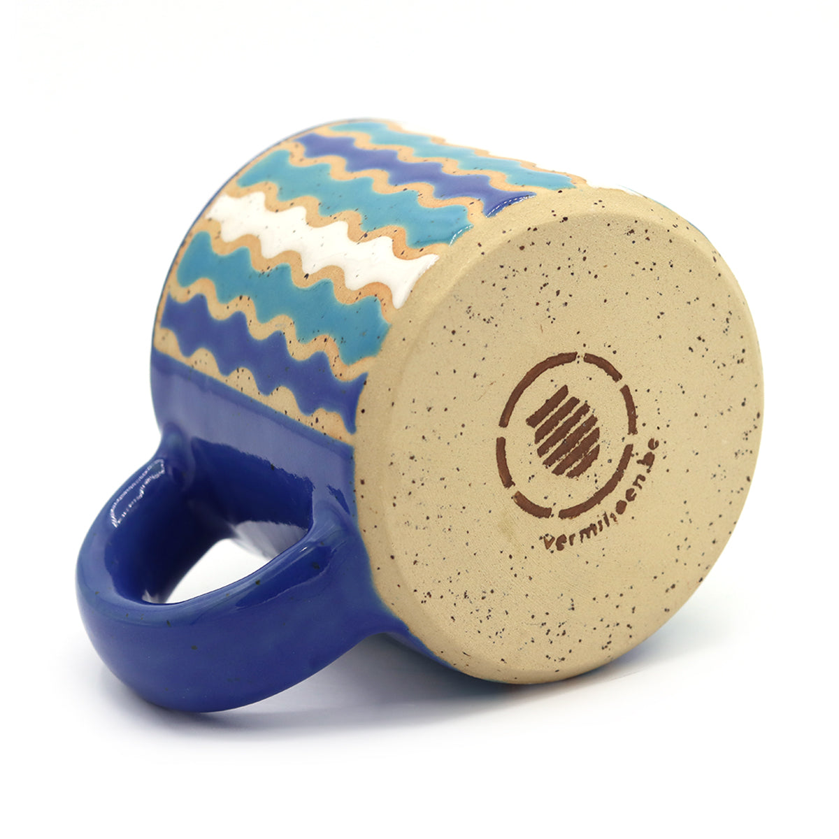 handmade ceramic mug with beautiful pattern in vibrant colors