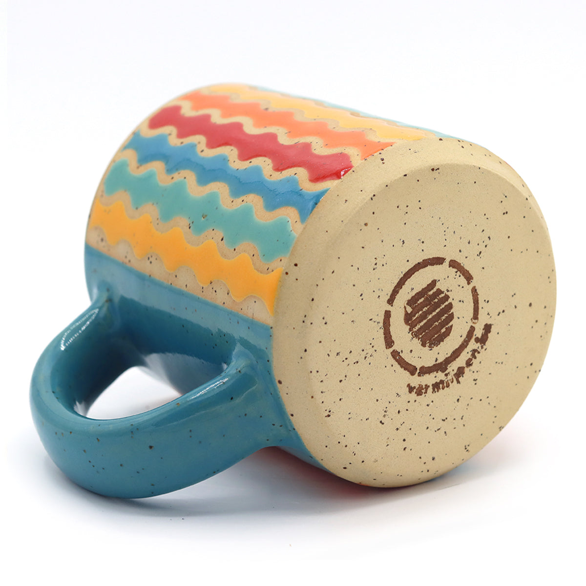 handmade speckled clay mug with colourful pattern 