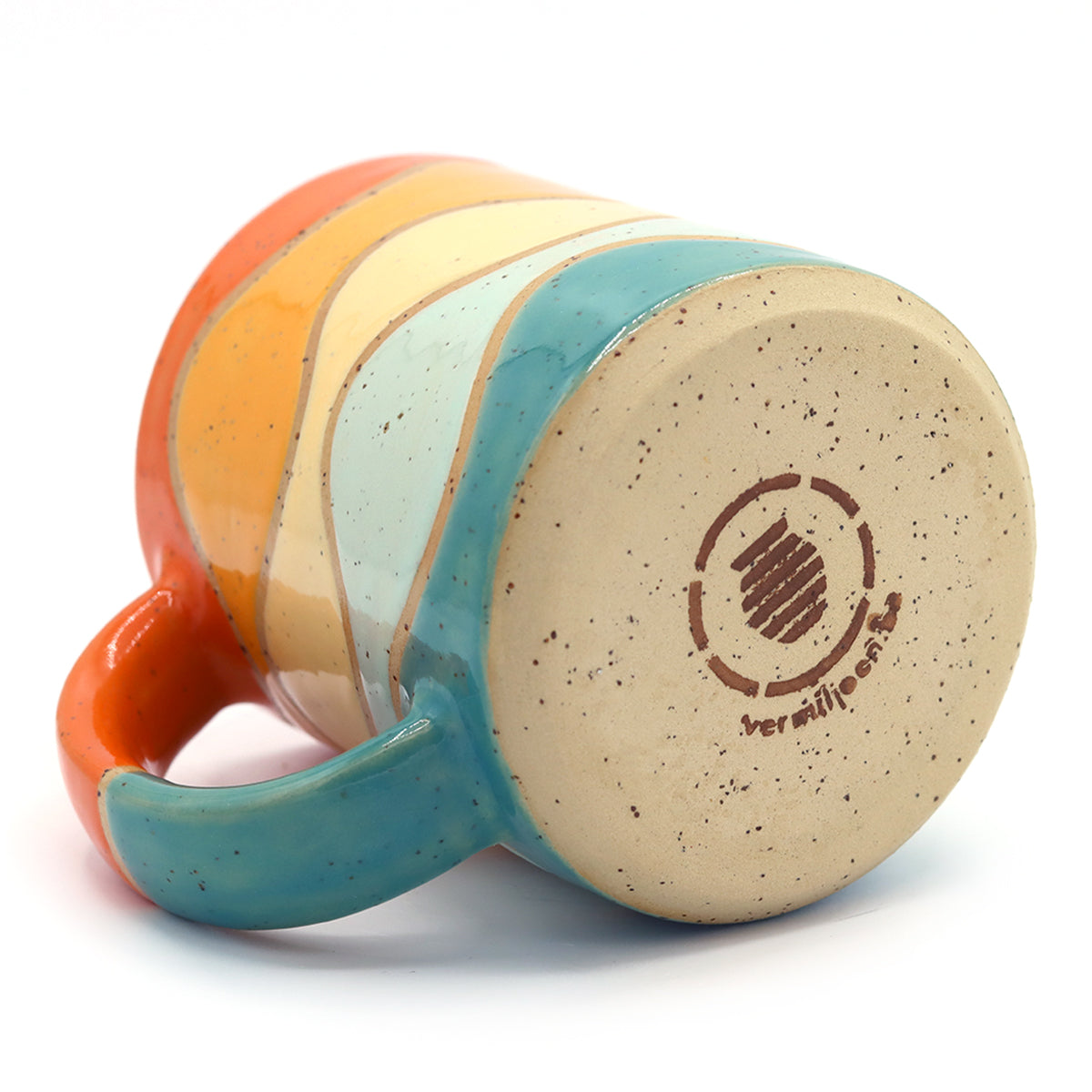 handmade ceramic mug with beautiful pattern in vibrant colours